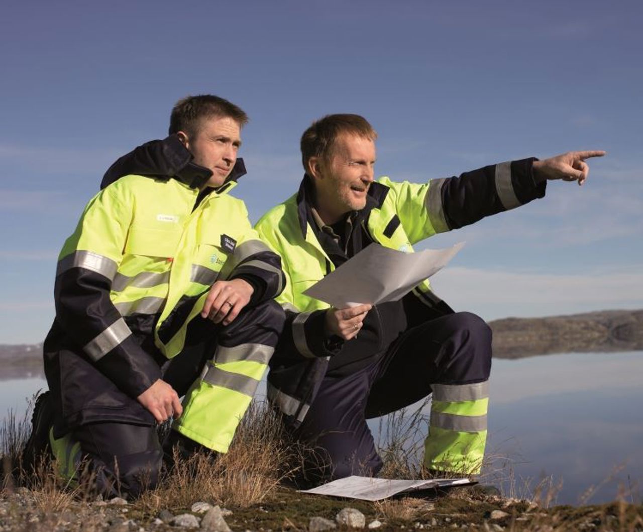 Employees pointing forwards